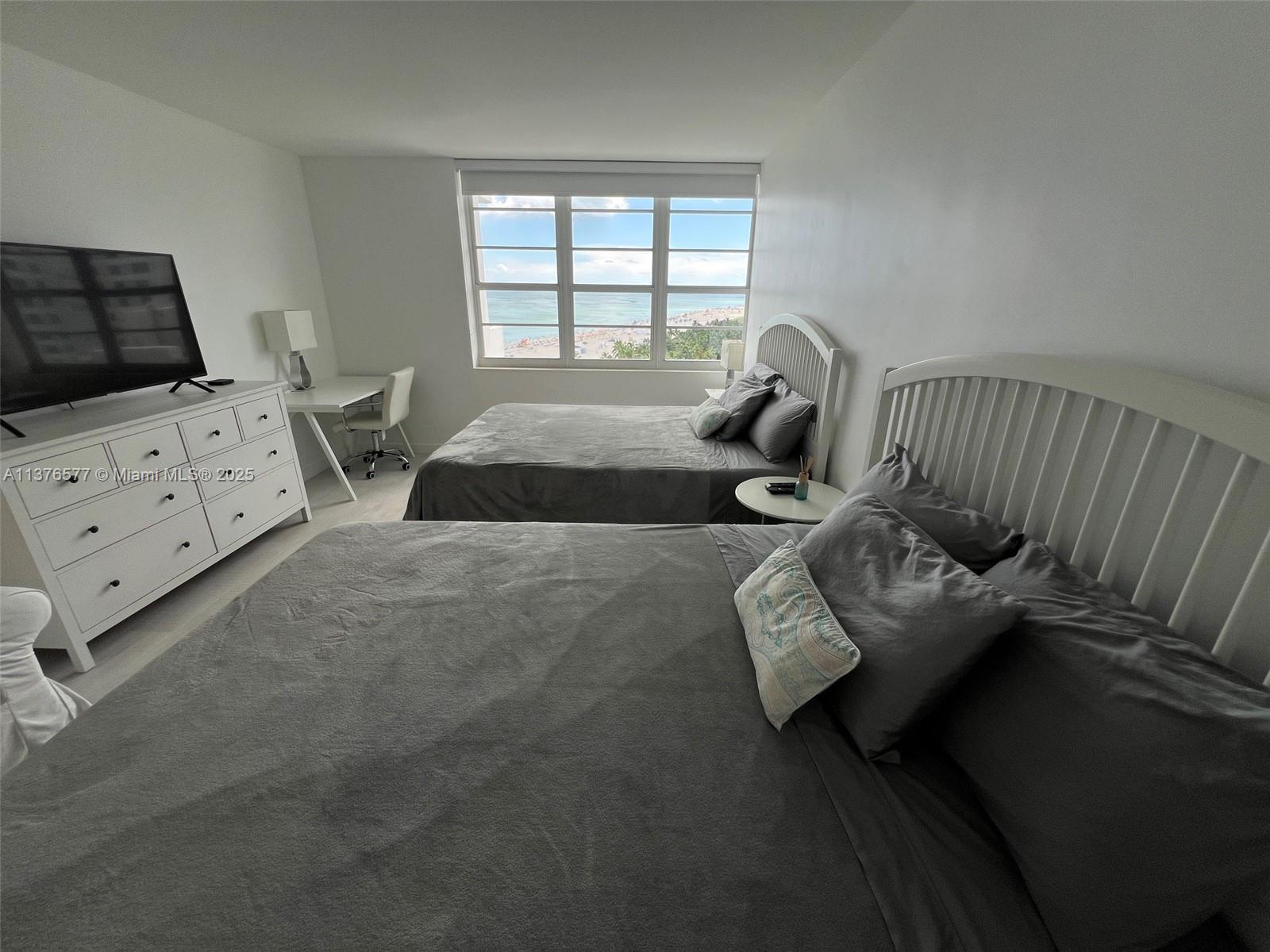 100 Lincoln Road, Unit 1244 Miami Beach, FL 33139 - Photo 23 of 68 a bed room with bed and a window