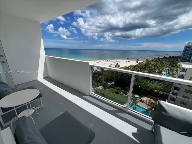 an aerial view of beach and ocean