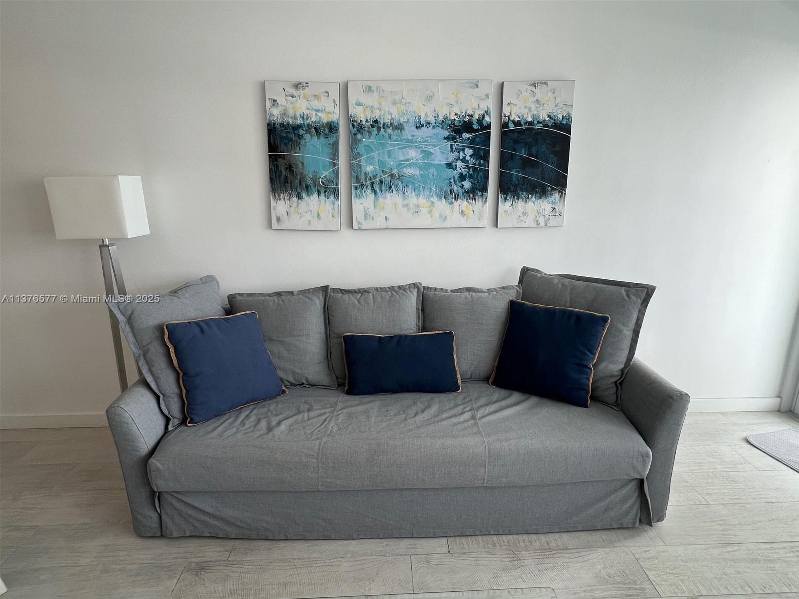 100 Lincoln Road, Unit 1244 Miami Beach, FL 33139 - Photo 10 of 68 a bedroom with a large bed and a window