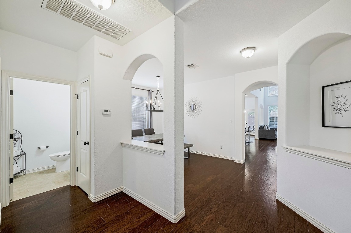 2229 Turtle Mountain Bend Austin, TX 78748 - Photo 14 of 38 wooden floor with white walls