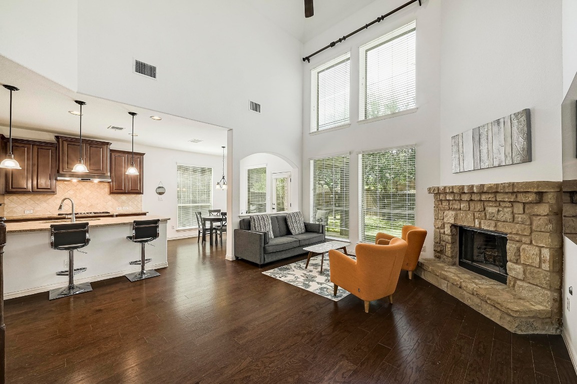 2229 Turtle Mountain Bend Austin, TX 78748 - Photo 36 of 38 a living room with furniture or fireplace and wooden floor