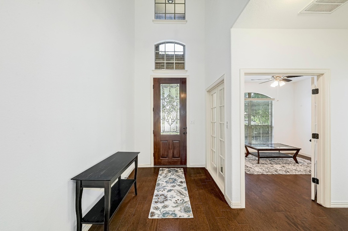 2229 Turtle Mountain Bend Austin, TX 78748 - Photo 20 of 38 a view of an entryway with wooden floor and a rug