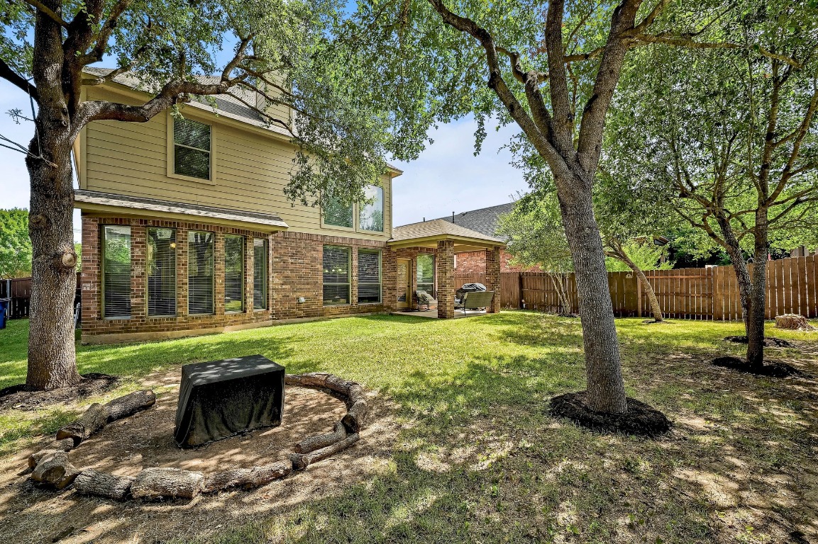 2229 Turtle Mountain Bend Austin, TX 78748 - Photo 34 of 38 a front view of a house with a yard