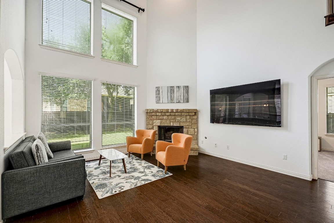2229 Turtle Mountain Bend Austin, TX 78748 - Photo 7 of 38 a living room with furniture and a fireplace