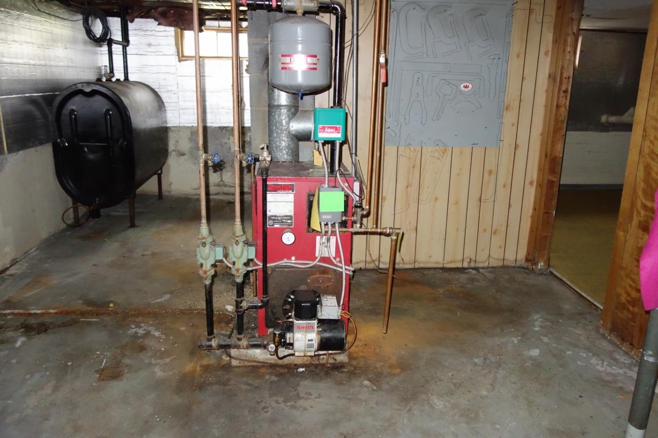 447 Swift River Road Mexico, ME 04257 - Photo 16 of 18 furnace and oil tank
