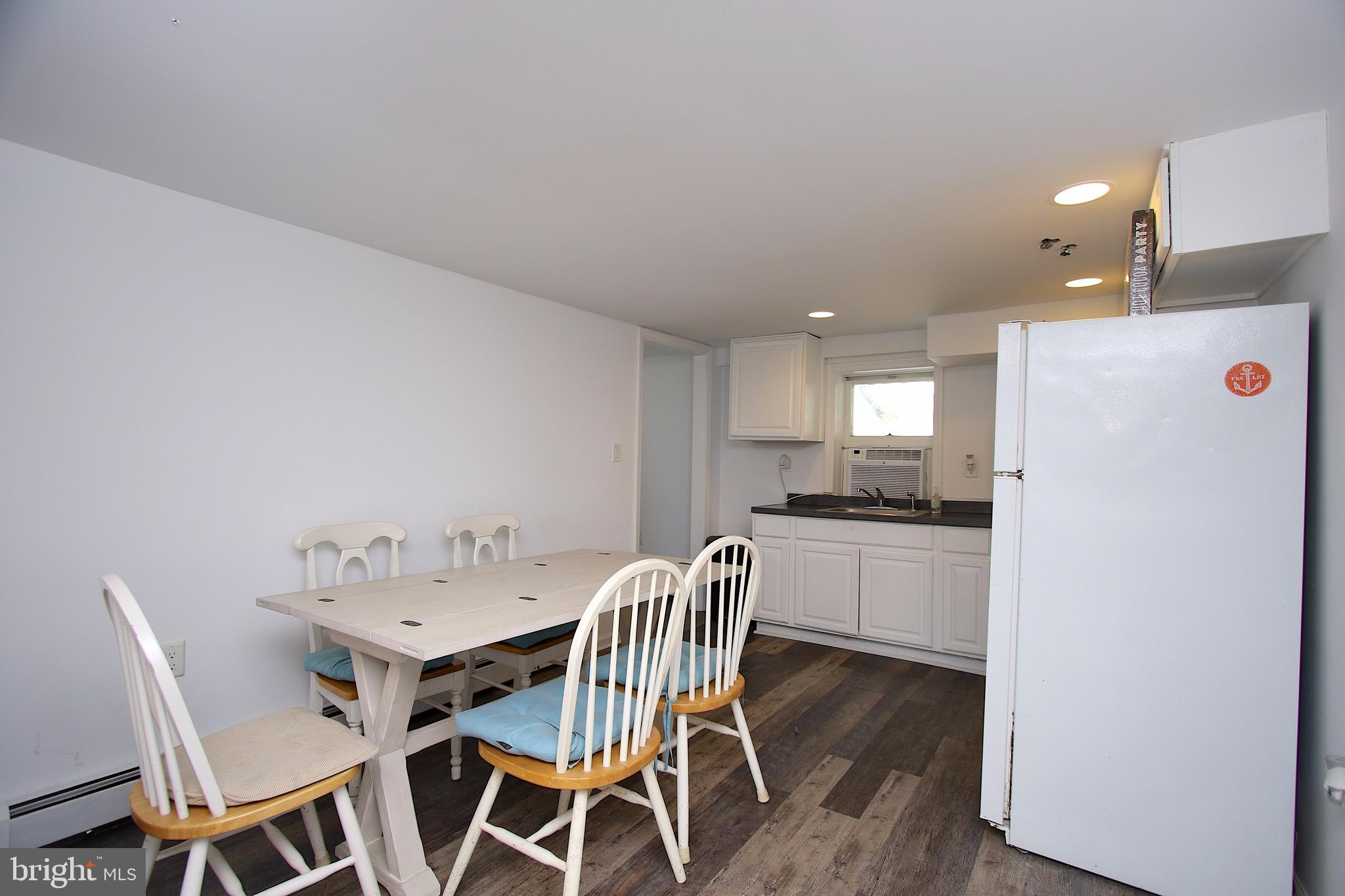 430 Dock Road Beach Haven, NJ 08008 - Photo 19 of 31 First floor game table and partial kitchen