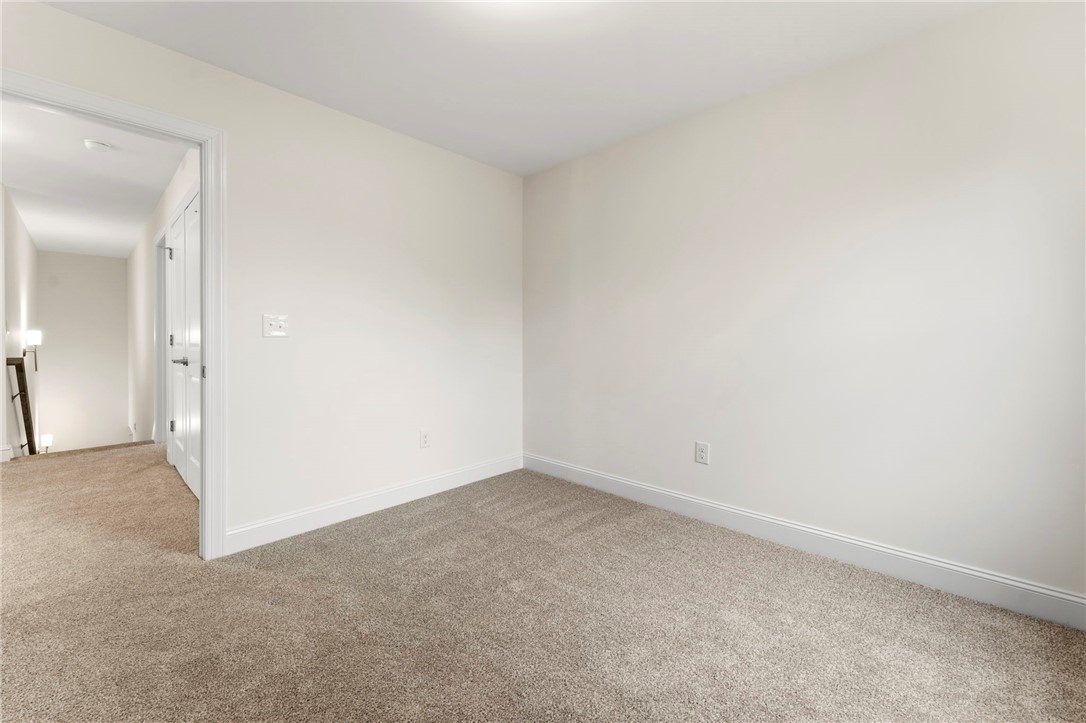505 Fire Tower Road Williamston, SC 29697 - Photo 31 of 37 This spacious room with neutral carpet flooring and white walls awaits your personal touch.