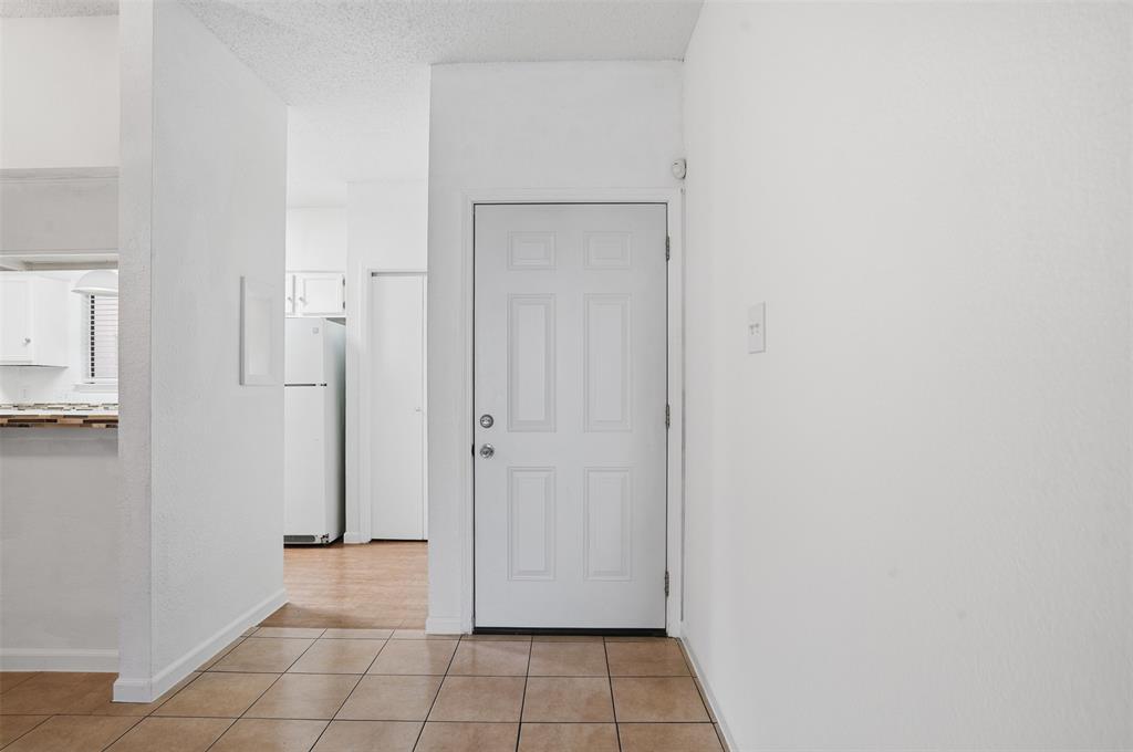 5550 Spring Valley Road, Unit F14 Dallas, TX 75254 - Photo 2 of 15 a view of an empty room