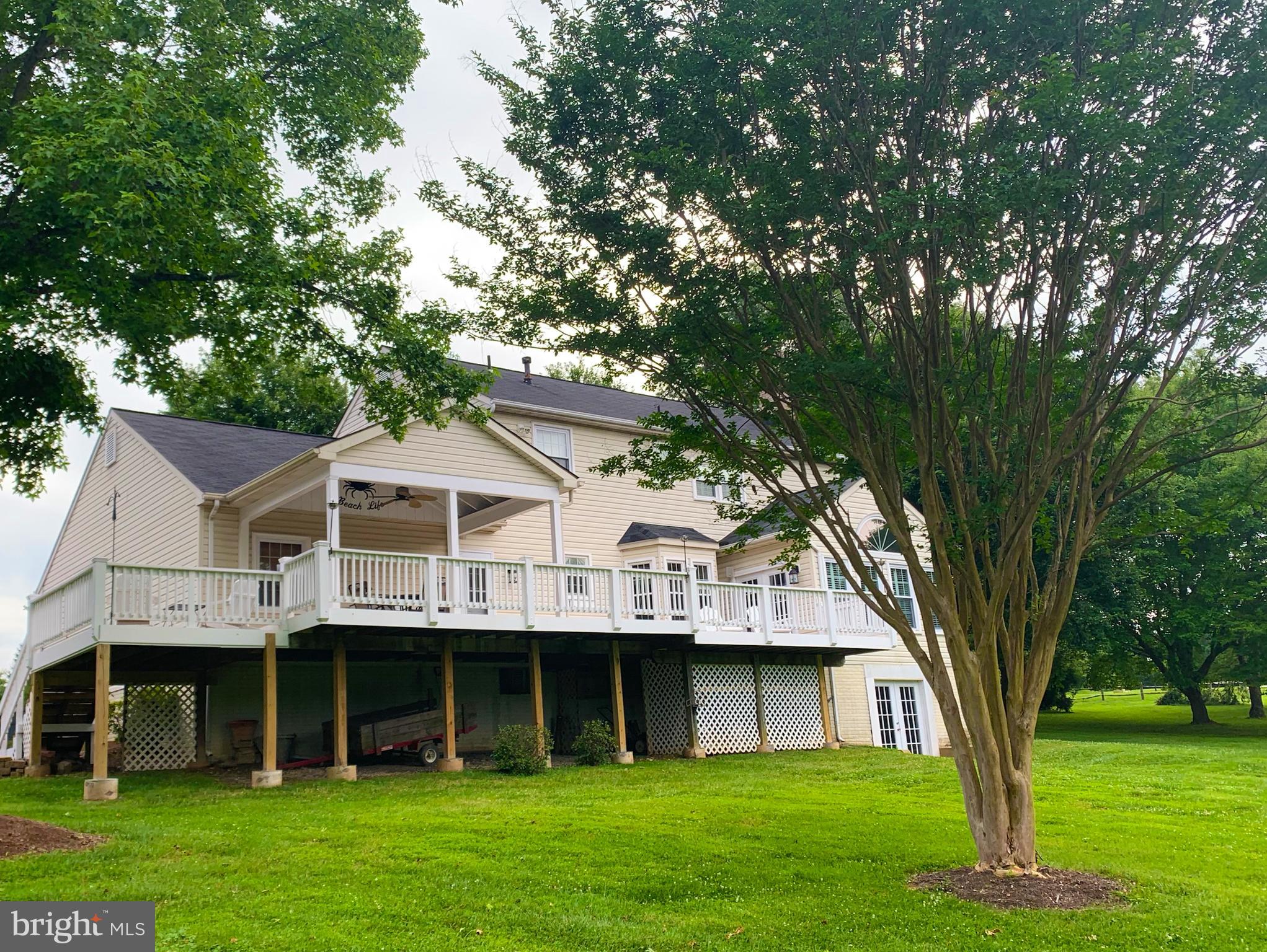 9217 Huntmaster Road Gaithersburg, MD 20882 - Photo 28 of 34 Huge extended deck overlooking beautiful backyard