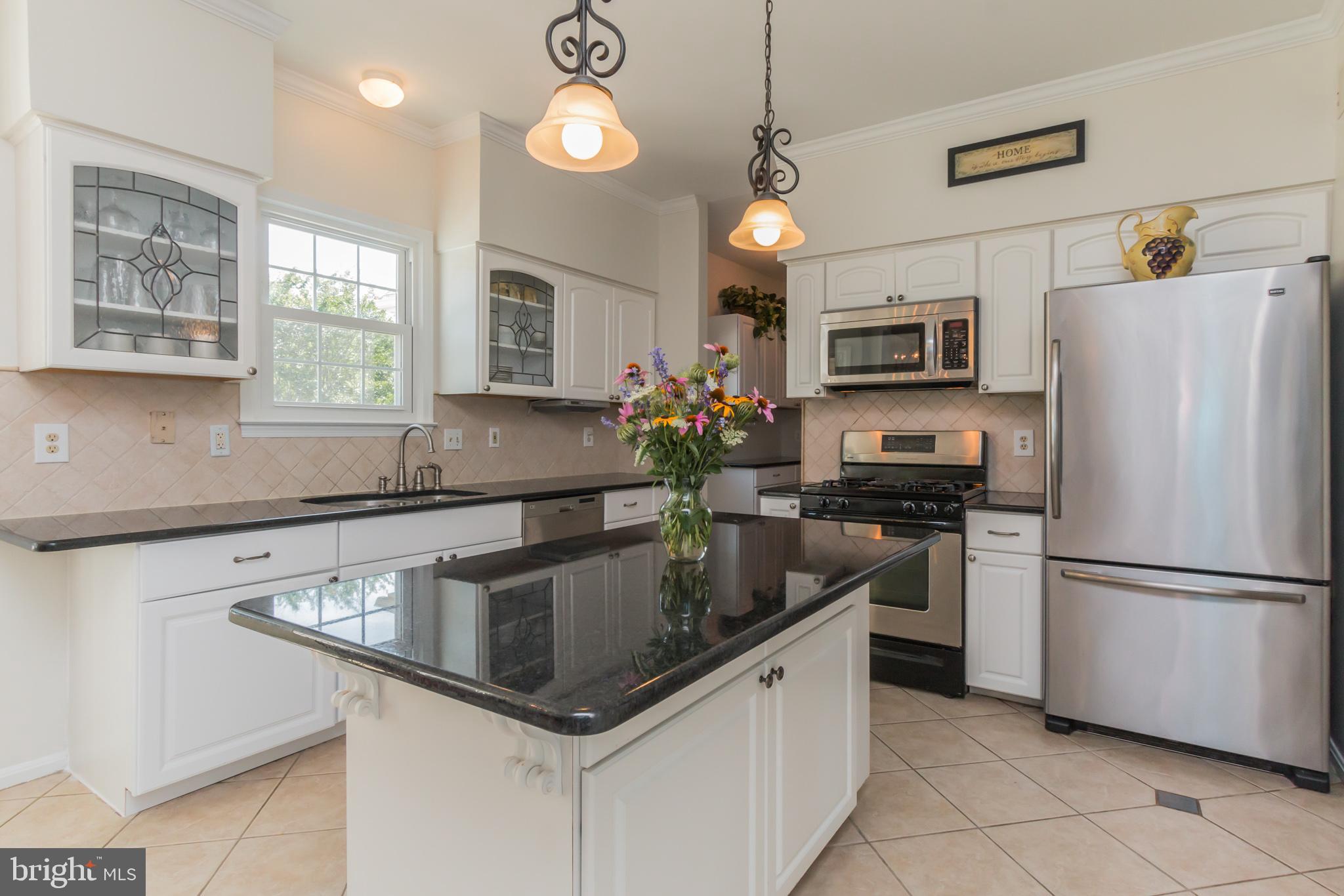 9217 Huntmaster Road Gaithersburg, MD 20882 - Photo 4 of 34 Updated kitchen with granite counters