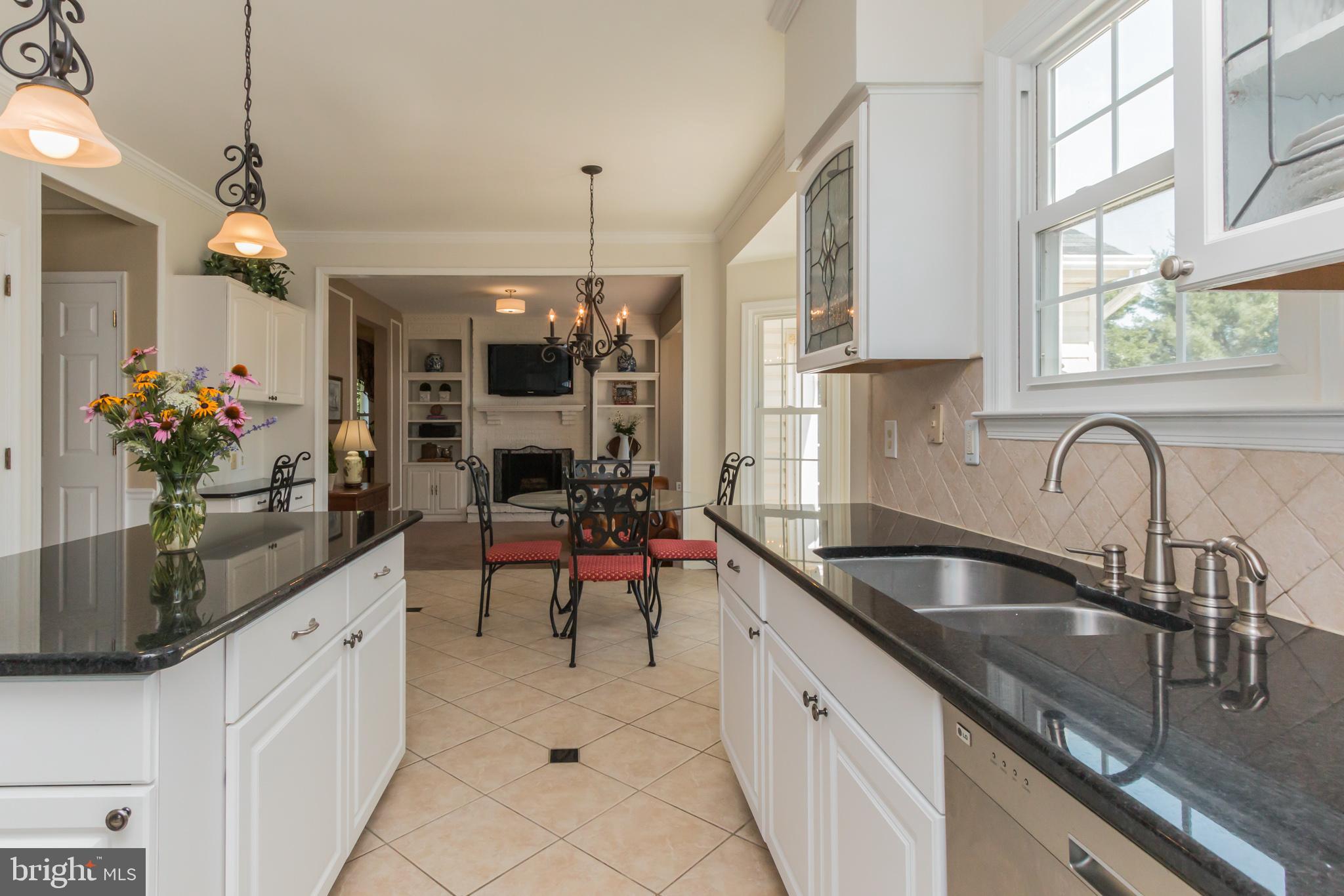 9217 Huntmaster Road Gaithersburg, MD 20882 - Photo 5 of 34 Kitchen opens to breakfast area and family room