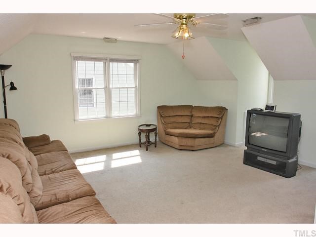 112 Fetzer Court Cary, NC 27513 - Photo 11 of 12 a living room with furniture and a window