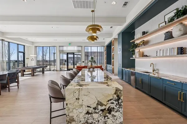 a very nice looking dining room with a table and chairs