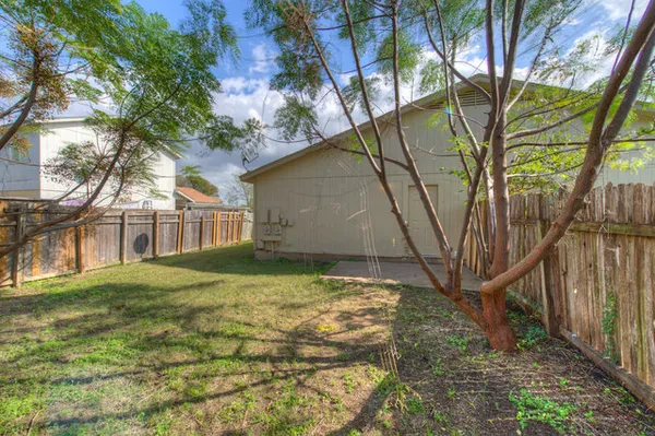 a yard with a trees