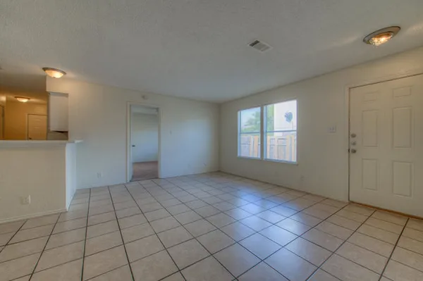 a view of an empty room and window
