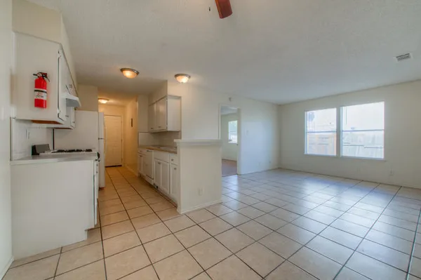 a view of kitchen and windows