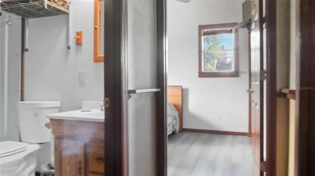 a bathroom with a sink and a toilet