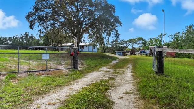 a view of a lake with a big yard