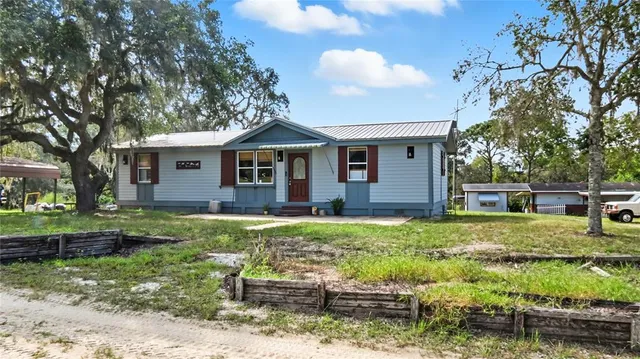a house view with a garden space