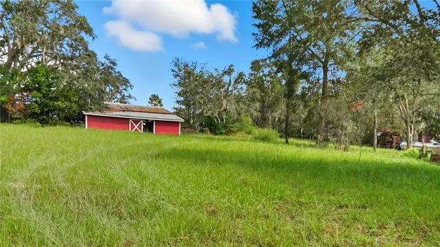 a view of front of house with a yard