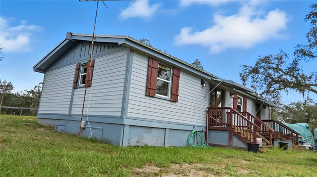 a front view of retail shop with outdoor seating