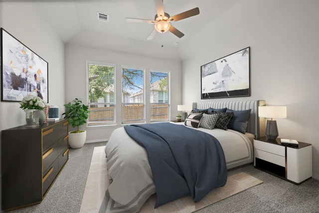 a bedroom with double bed and a window