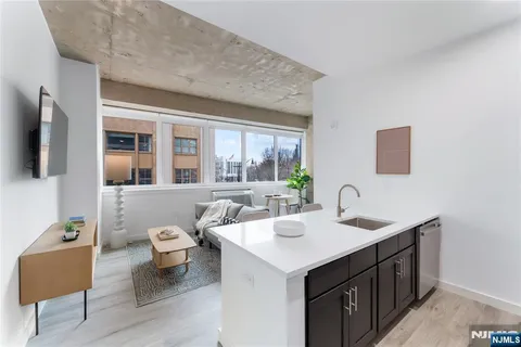 a bathroom with a sink double vanity and a mirror