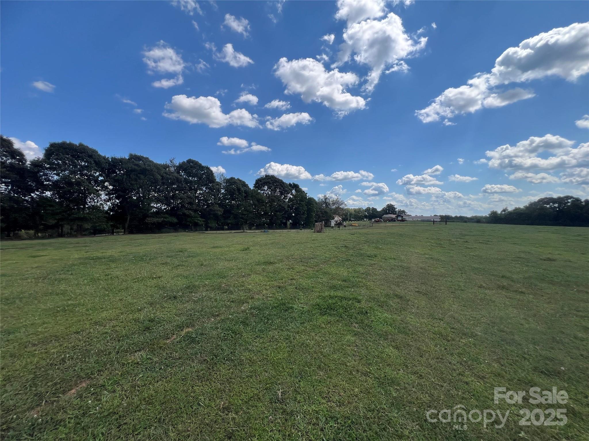 1301 Double Springs Church Road Shelby, NC 28150 - Photo 25 of 42 a view of a golf course with a lake