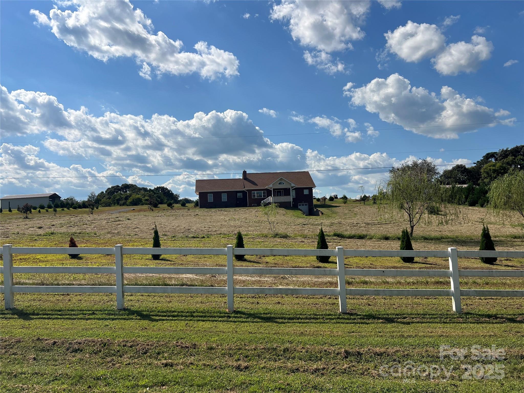 1301 Double Springs Church Road Shelby, NC 28150 - Photo 37 of 42 a view of a swimming pool with a yard