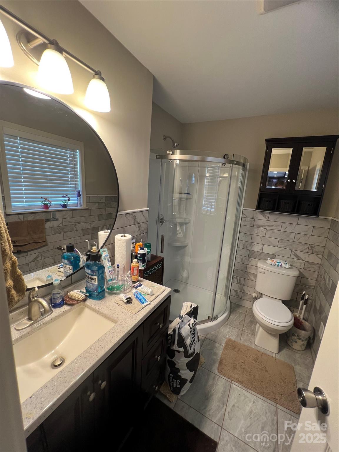 1301 Double Springs Church Road Shelby, NC 28150 - Photo 4 of 42 a bathroom with a sink mirror and toilet