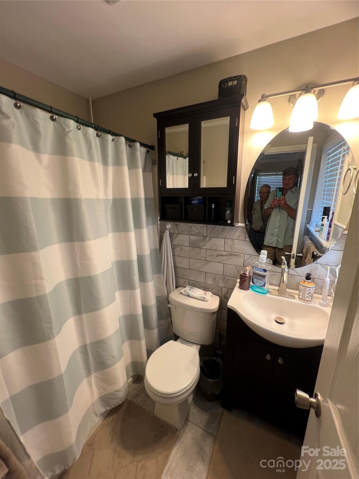 1301 Double Springs Church Road Shelby, NC 28150 - Photo 5 of 42 a bathroom with a toilet sink and mirror