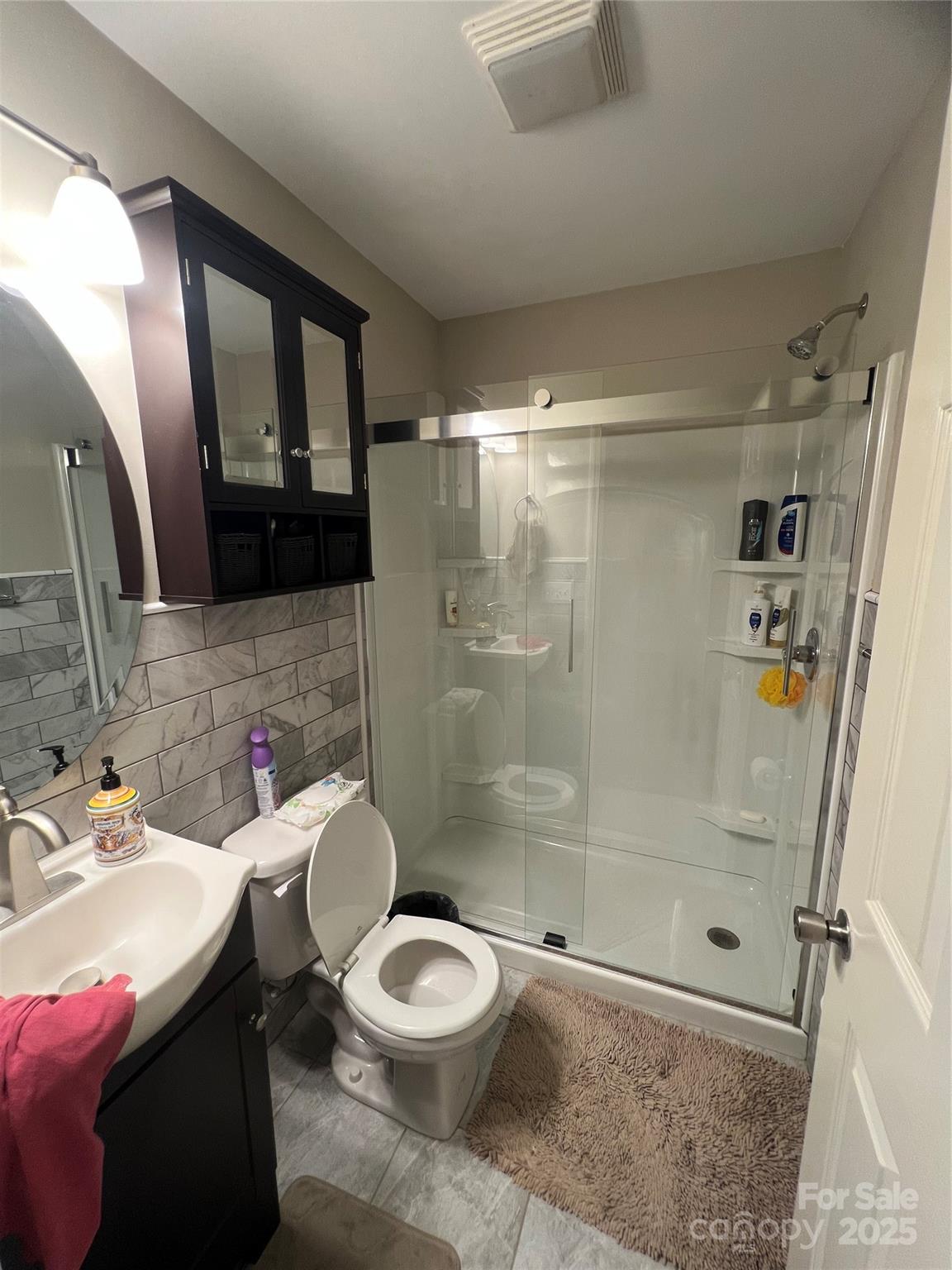 1301 Double Springs Church Road Shelby, NC 28150 - Photo 6 of 42 a bathroom with a sink toilet and shower