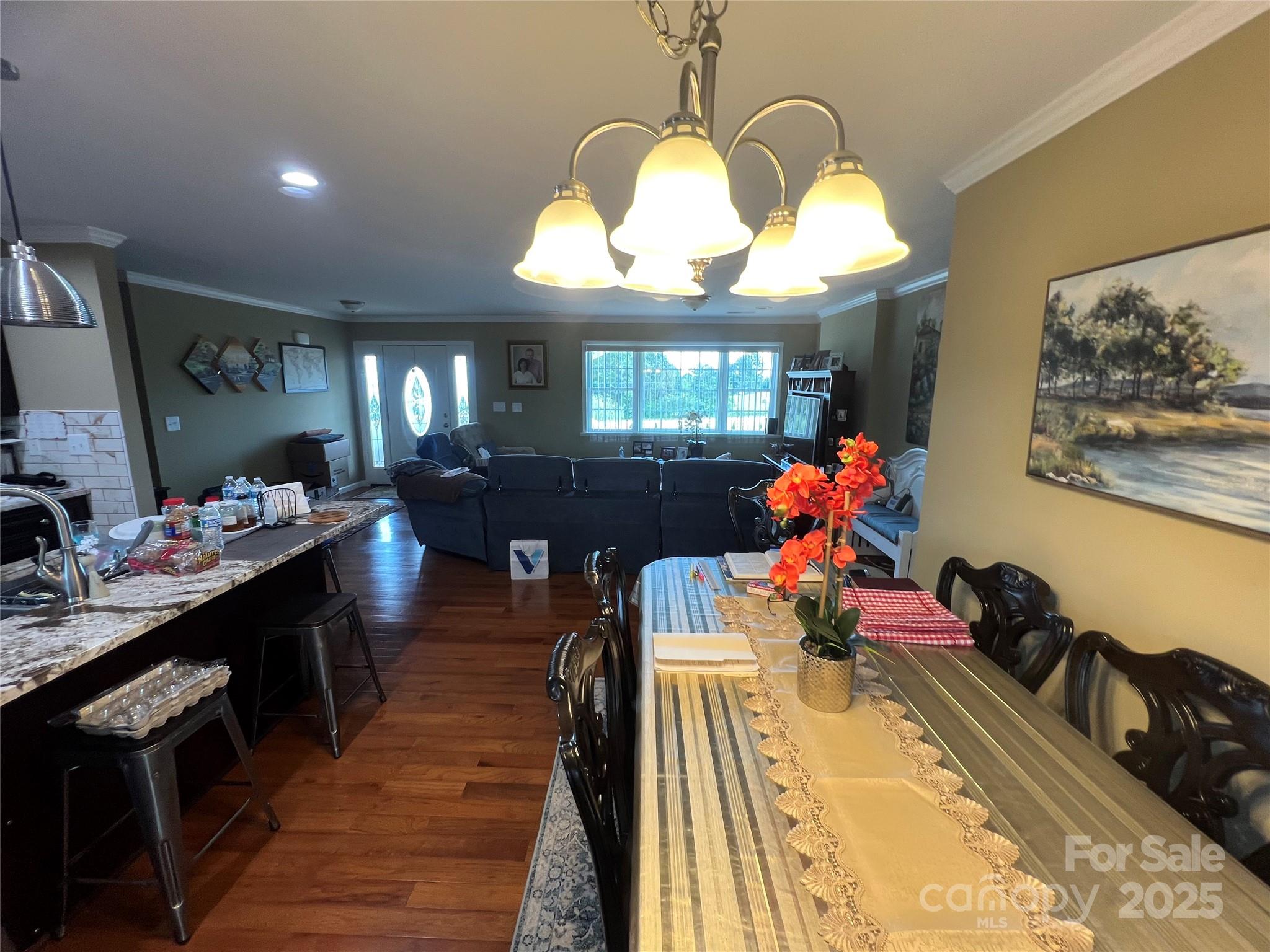 1301 Double Springs Church Road Shelby, NC 28150 - Photo 8 of 42 a view of a dining room with furniture and chandelier