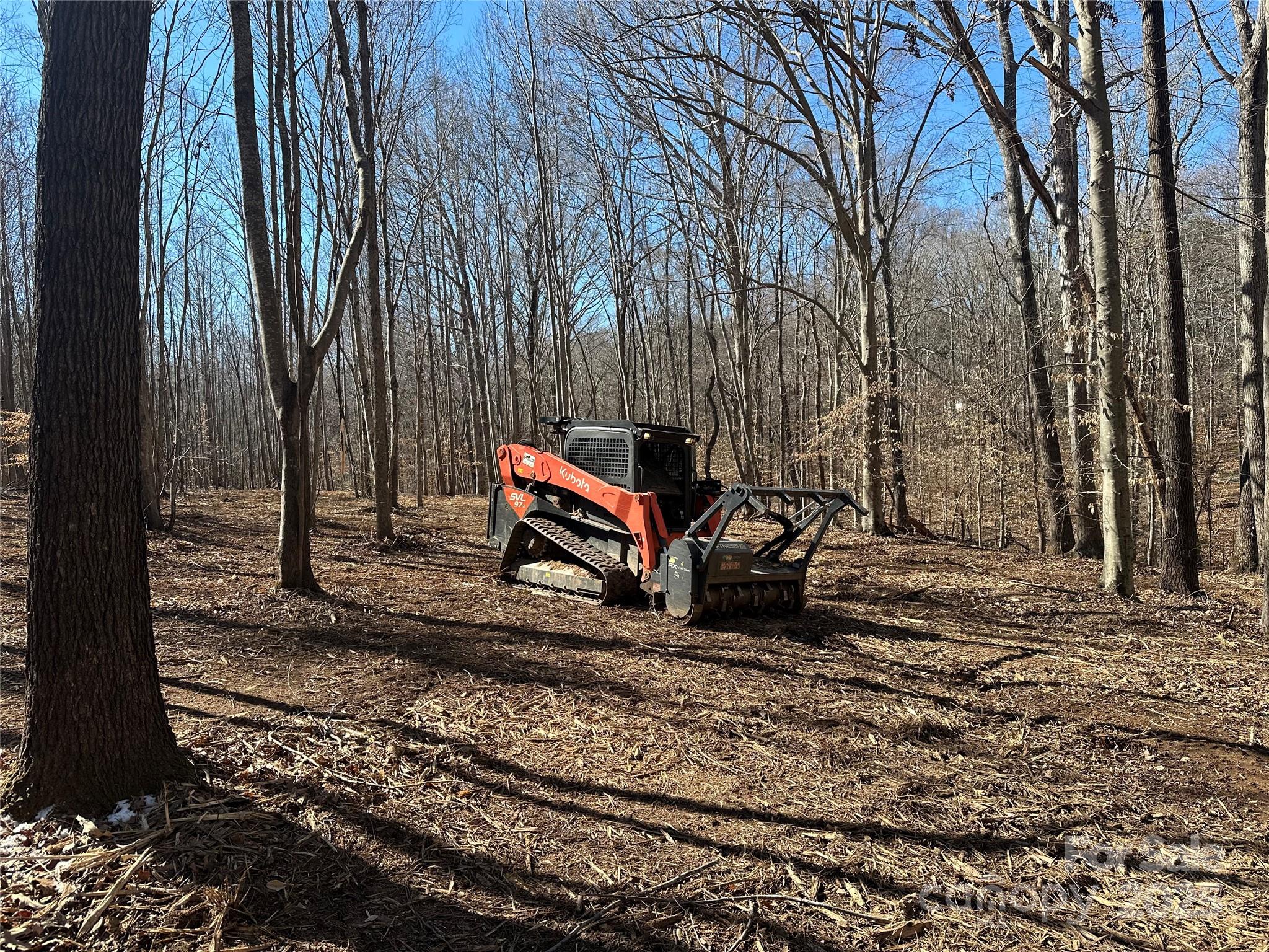 0 Lytton Farm Road Troutman, NC 28166 - Photo 8 of 20 a backyard of a house with barbeque oven table and chairs