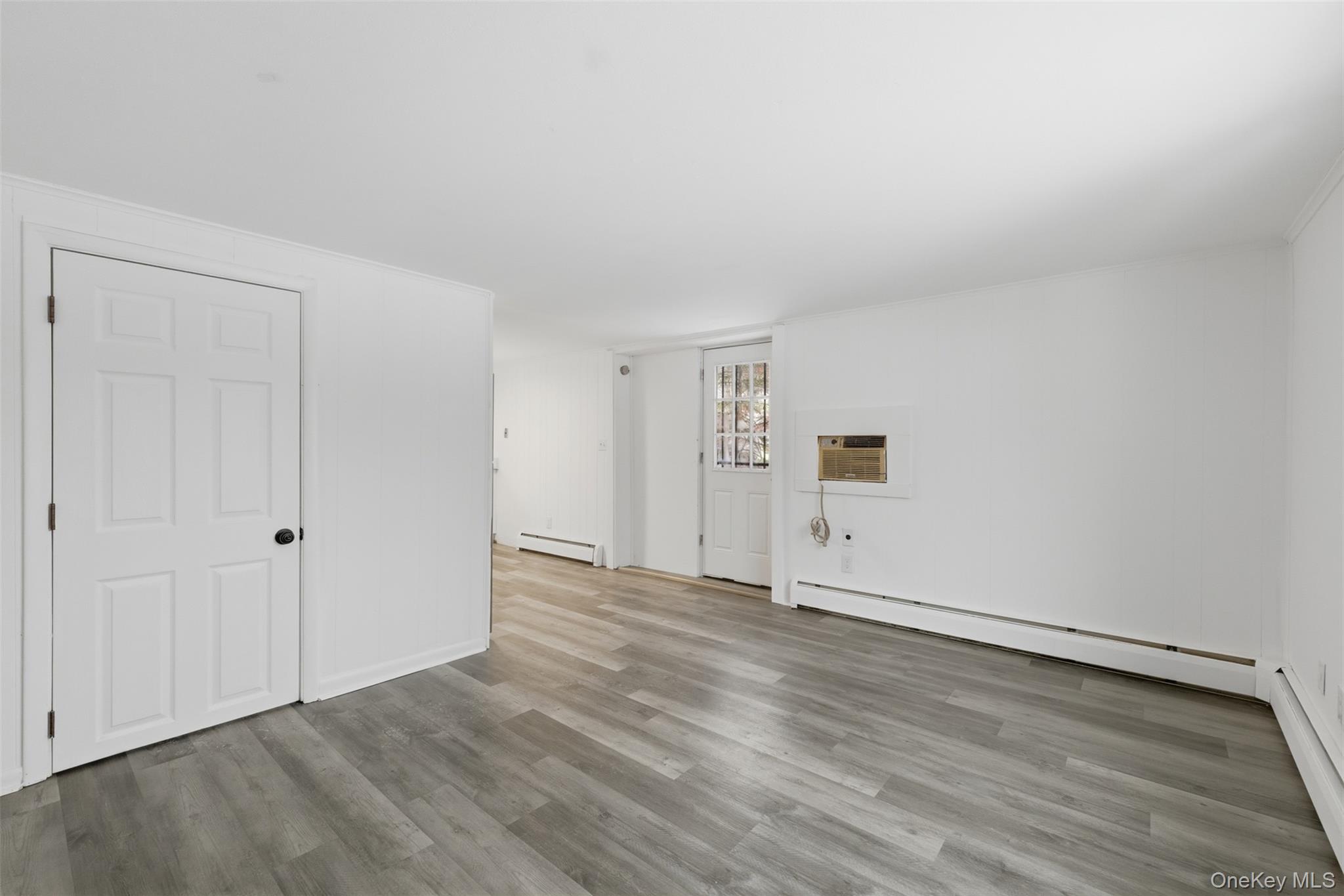 63 Parksville Road Pleasant Valley, NY 12569 - Photo 8 of 20 a view of an empty room with wooden floor