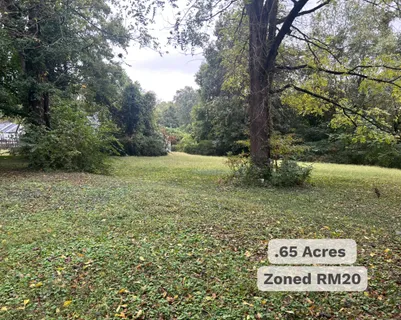 an aerial view of a house with swimming pool