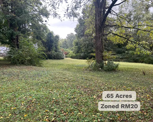an aerial view of a house with swimming pool
