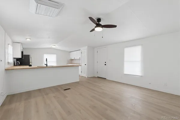 a view of an empty room with window