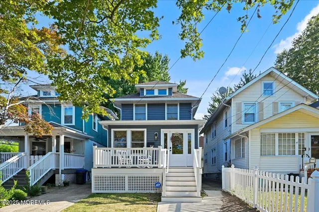 a front view of a house with a porch