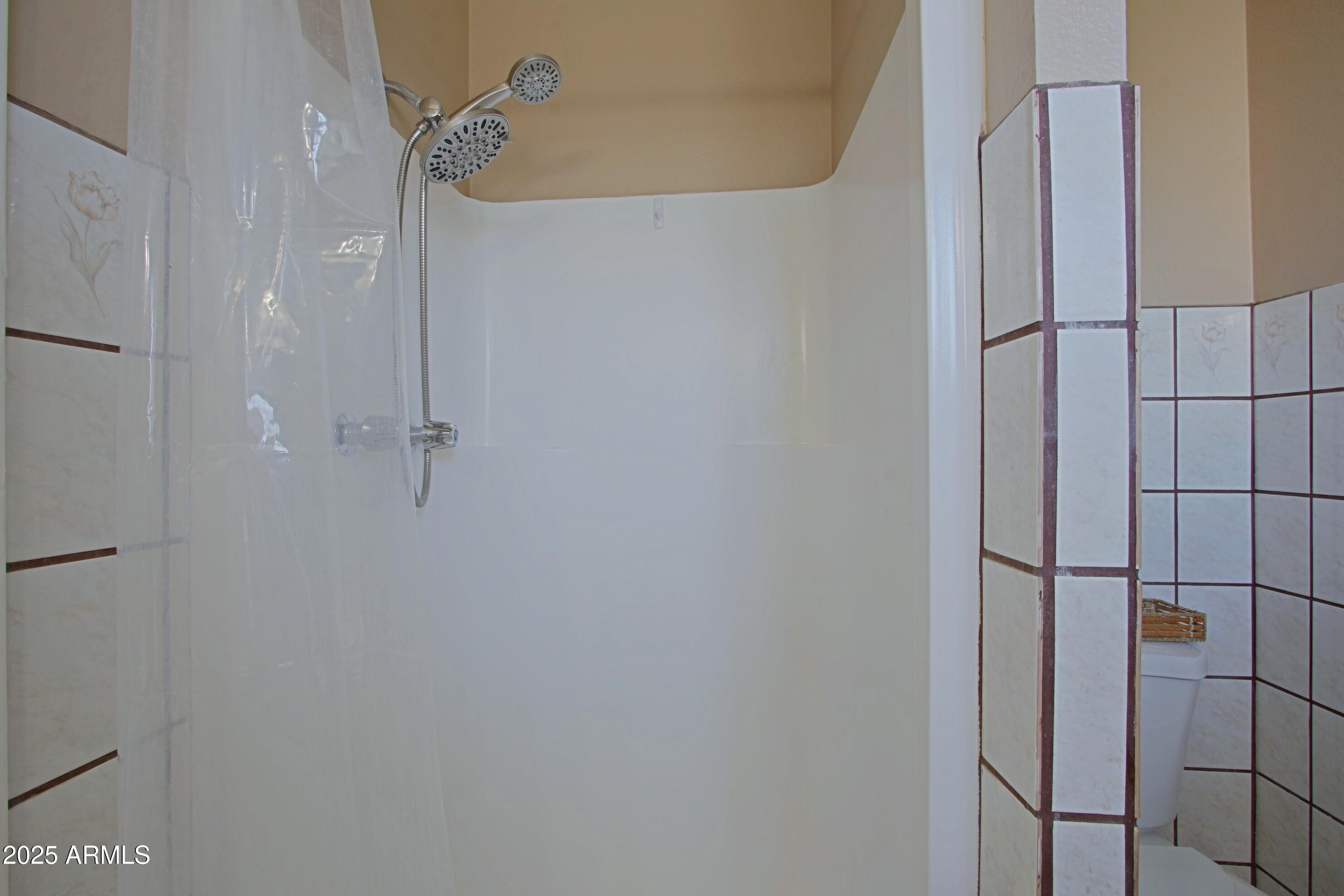 4526 West Altadena Avenue Glendale, AZ 85304 - Photo 16 of 38 a bathroom with a shower