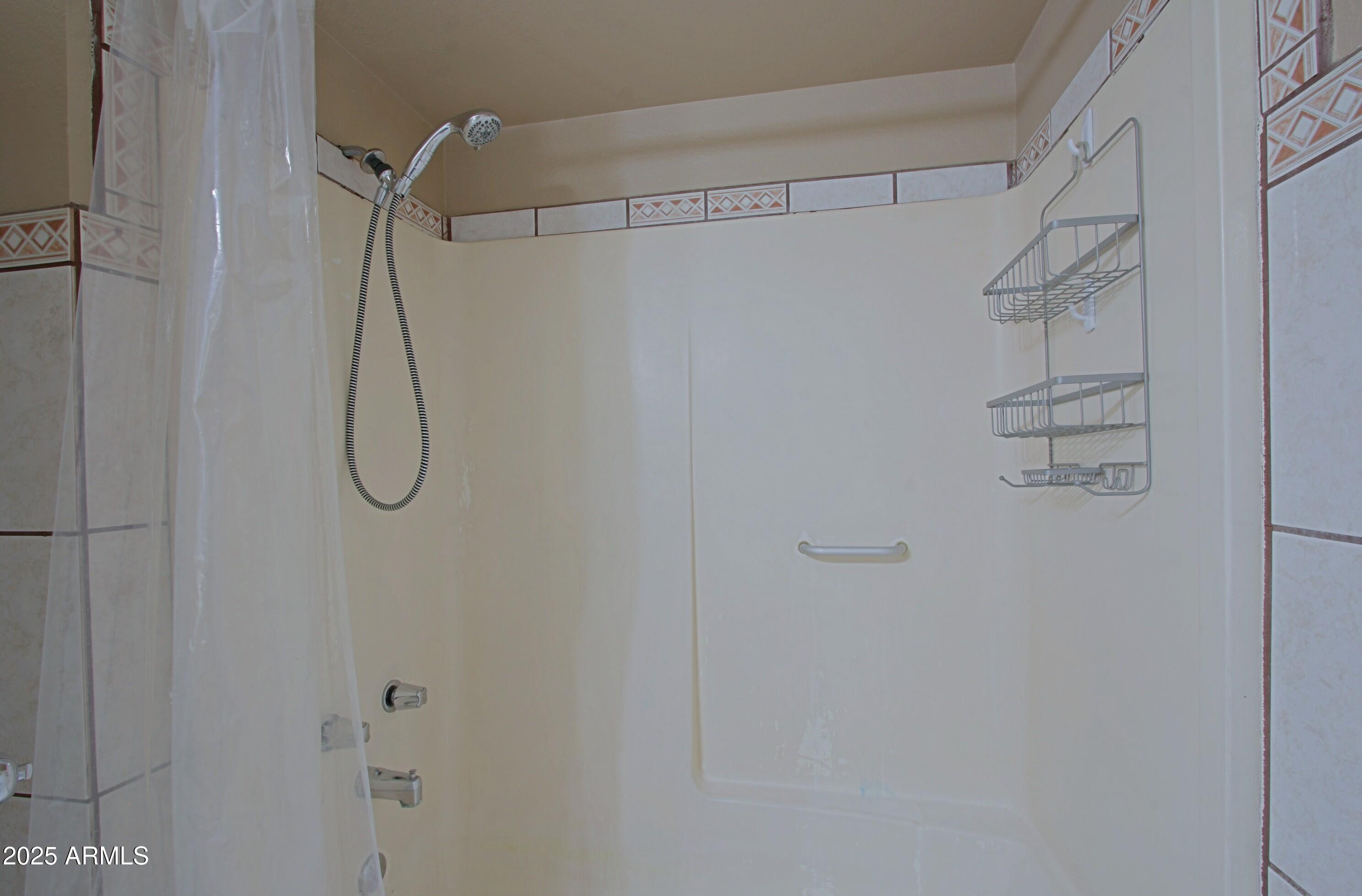 4526 West Altadena Avenue Glendale, AZ 85304 - Photo 19 of 38 a bathroom with a shower