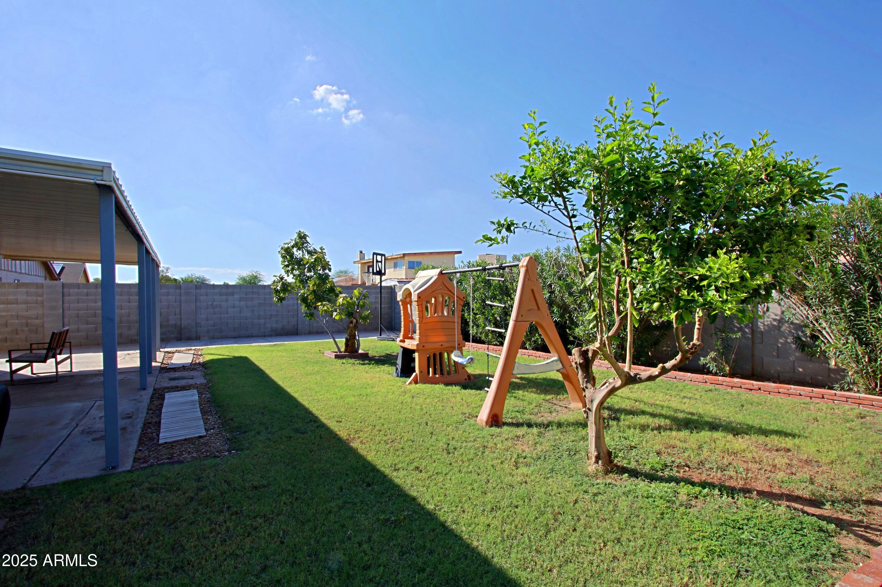 4526 West Altadena Avenue Glendale, AZ 85304 - Photo 35 of 38 a view of a park with a slide