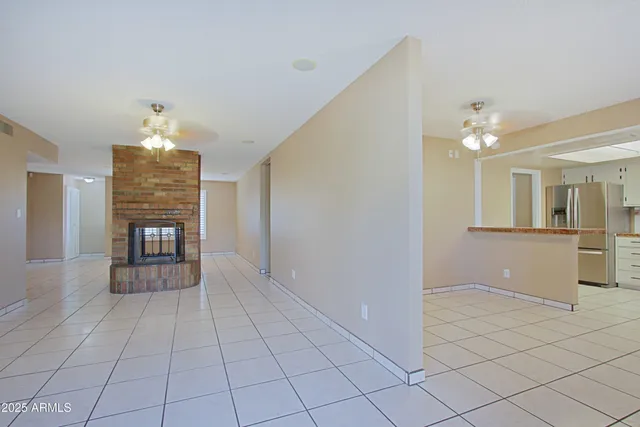 a view of an empty room and window