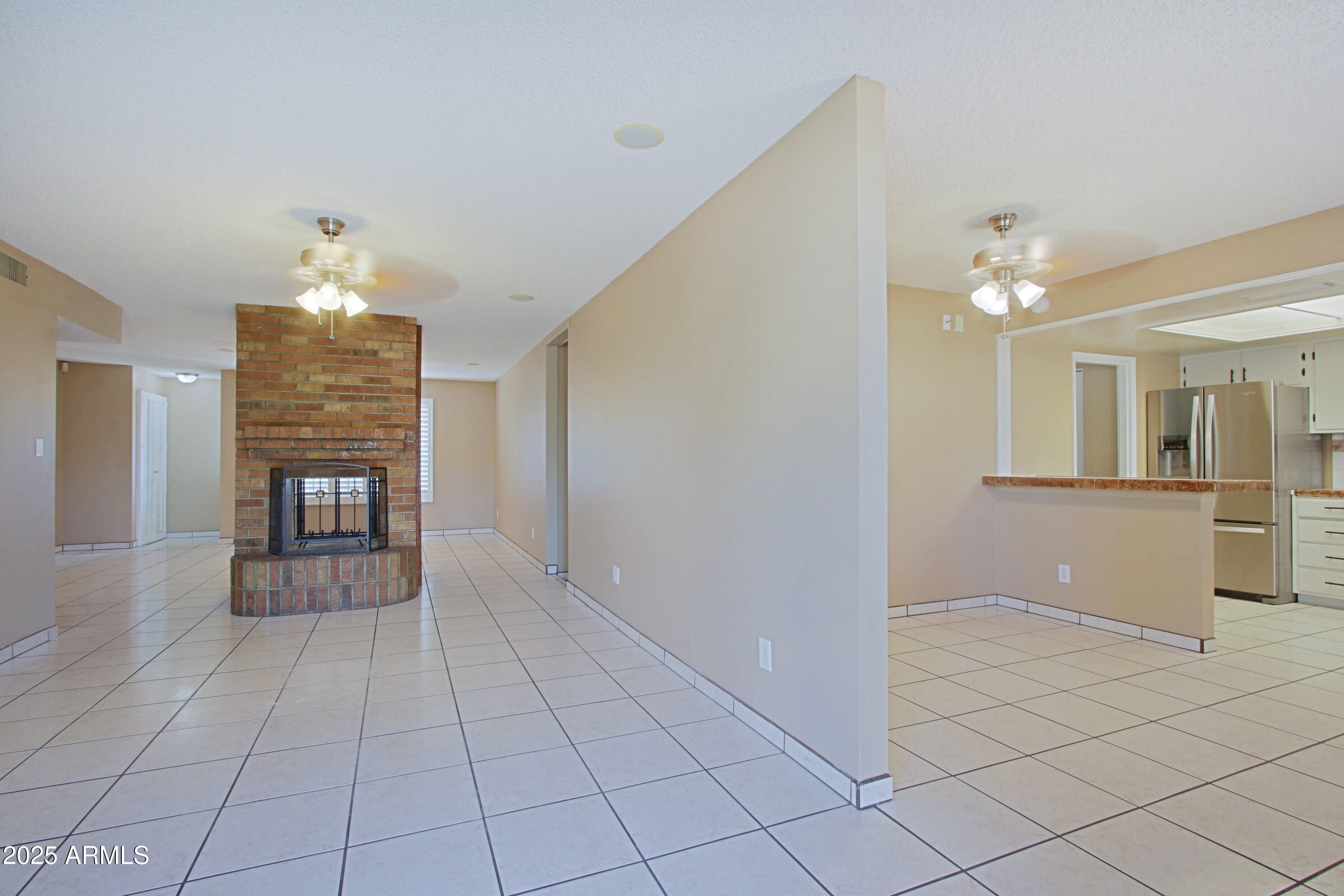 4526 West Altadena Avenue Glendale, AZ 85304 - Photo 6 of 38 a view of an empty room and window