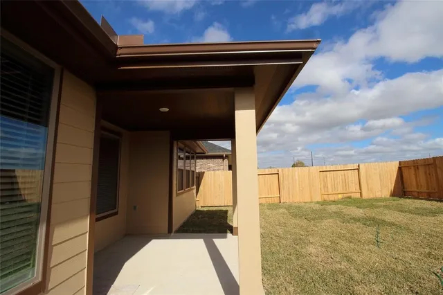 a house with yard in front of it