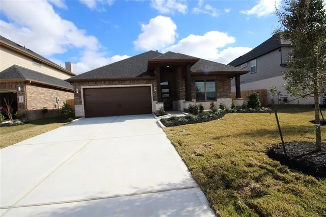 a front view of a house with patio