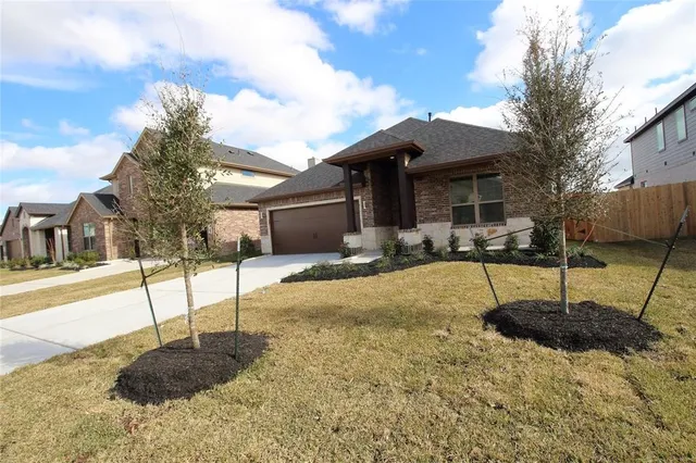 a swimming pool with a bench in front of it