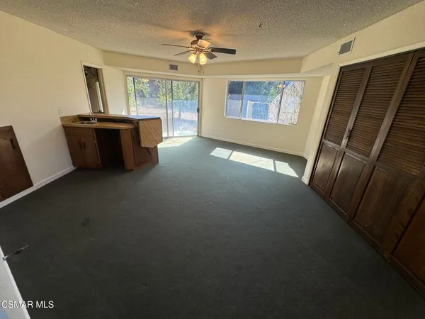 a view of a livingroom with a fireplace