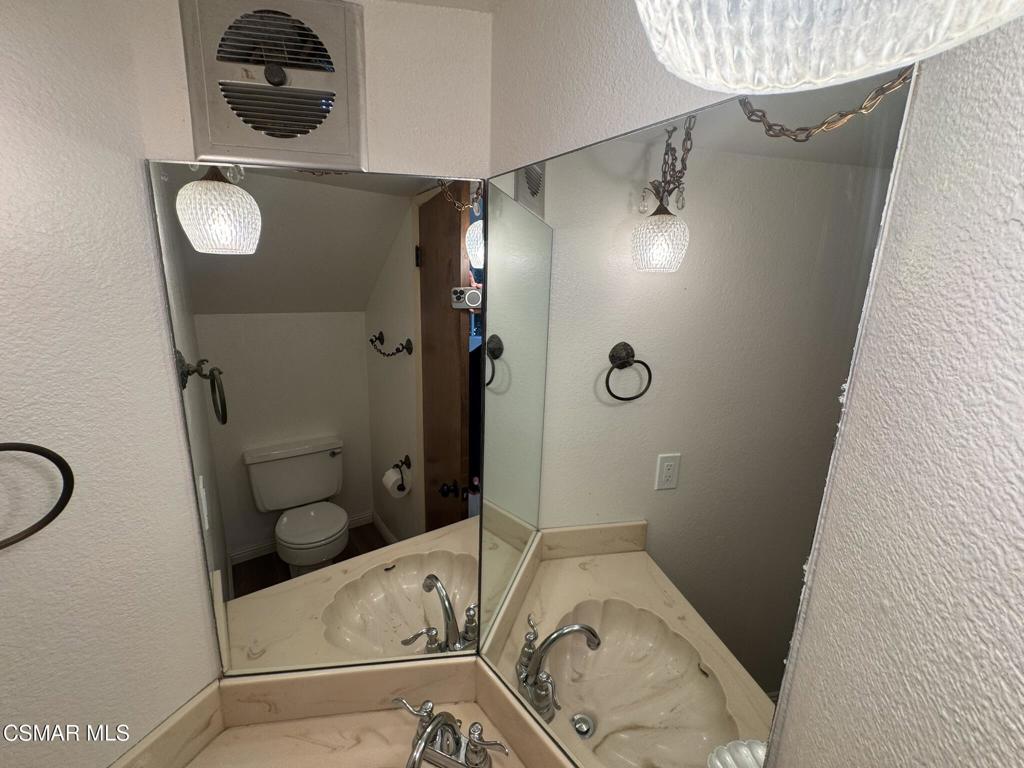 381 Laguna Terrace Simi Valley, CA 93065 - Photo 25 of 48 a bathroom with a toilet and a shower