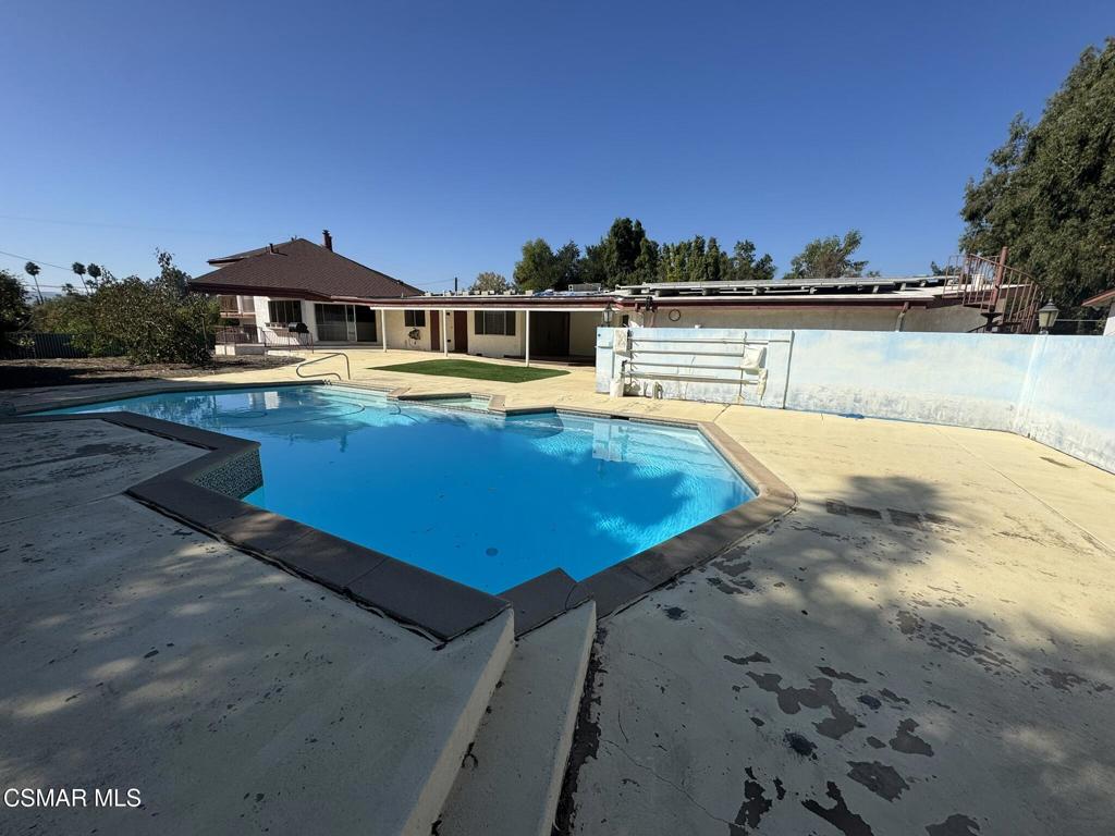 381 Laguna Terrace Simi Valley, CA 93065 - Photo 35 of 48 a view of a swimming pool with an outdoor seating
